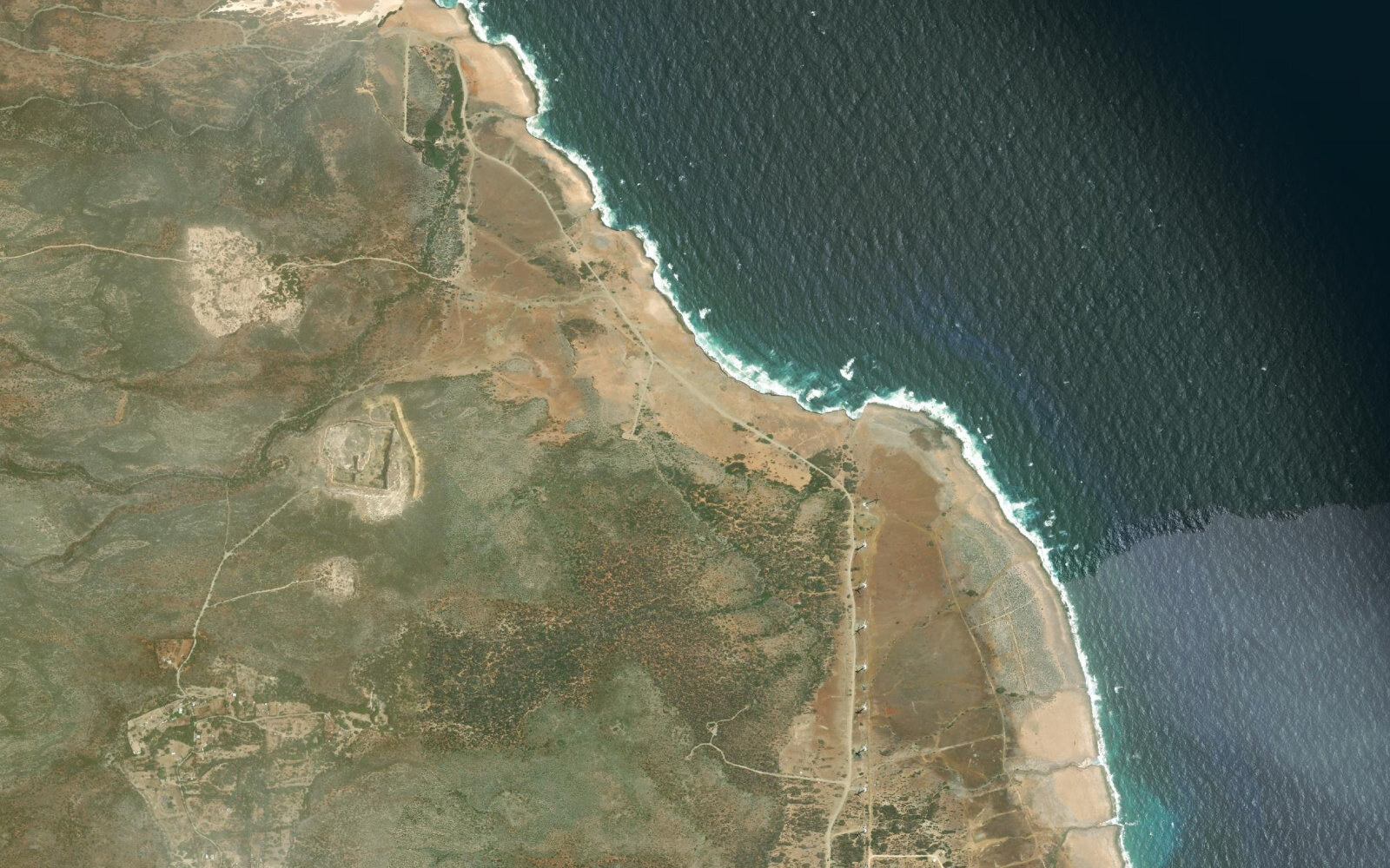 Esri satellite image centered on Aruba in the southern Caribbean.